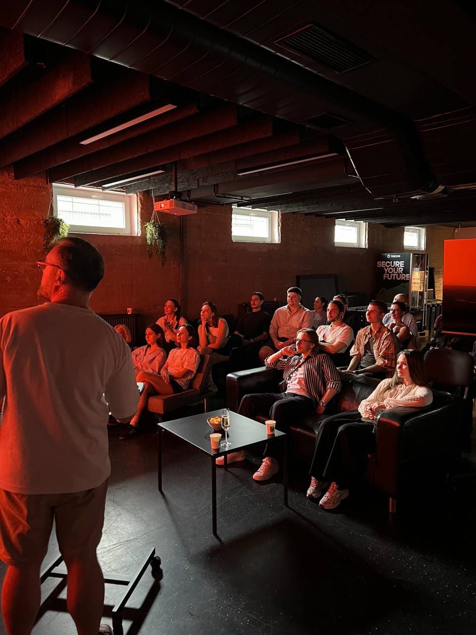 Anton presenting to the room at a design meetup